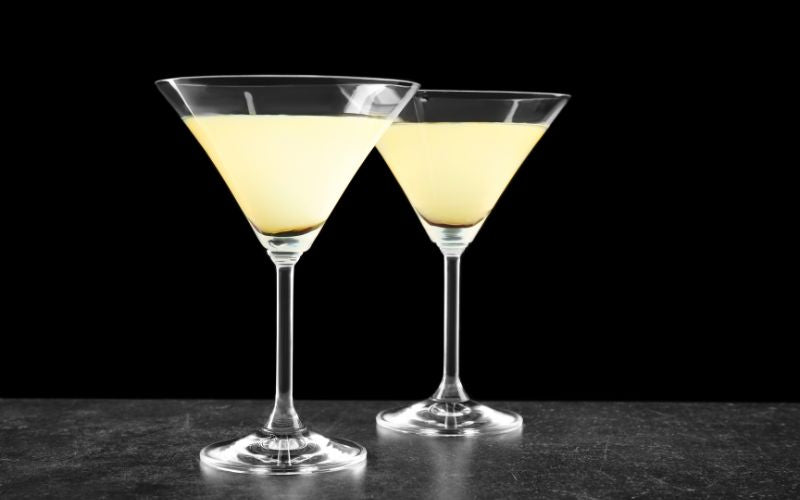 Glasses of In and Out Lemontini on a dark background