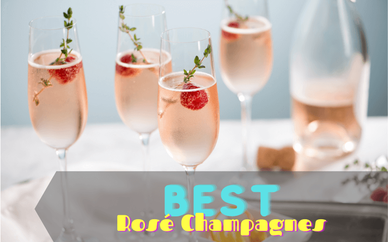 Glasses of Rosé Champagne with raspberries and herbs