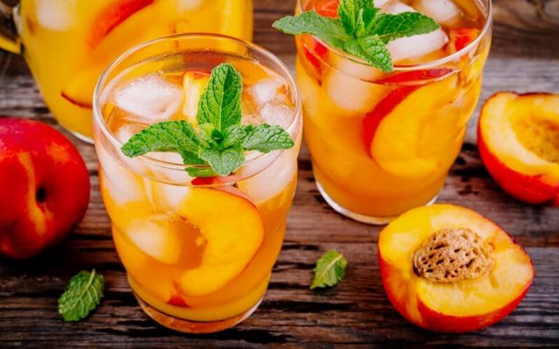 Glasses of White Wine Peach and Mango Sangria 