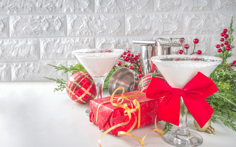 Glasses of white Christmas martini in a white background