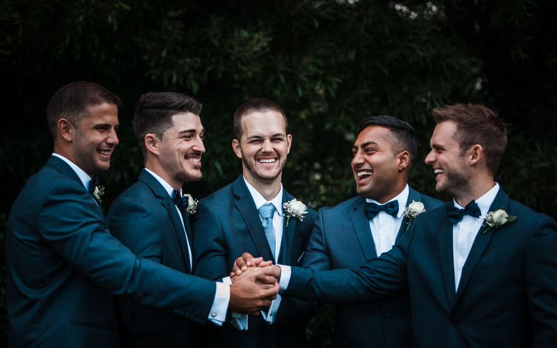 Groomsmen with their hands together