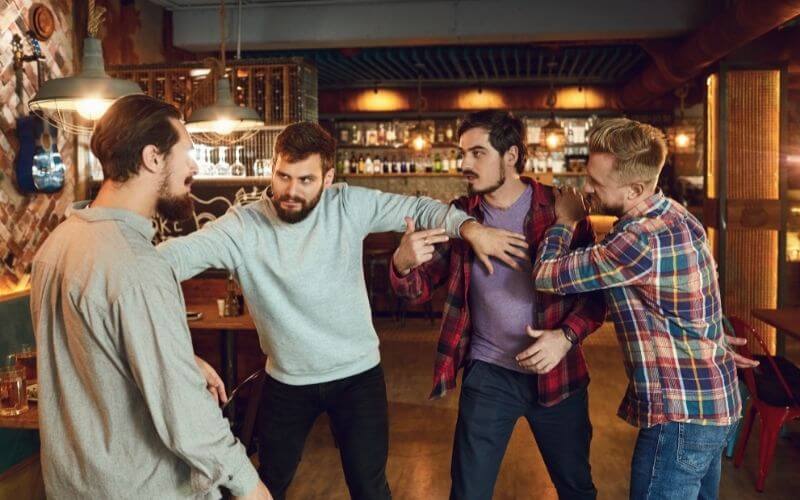 Guys about to make a fight in a bar