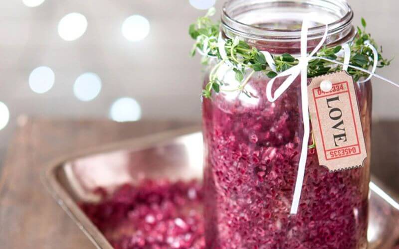 Jar and tray of red wine salt