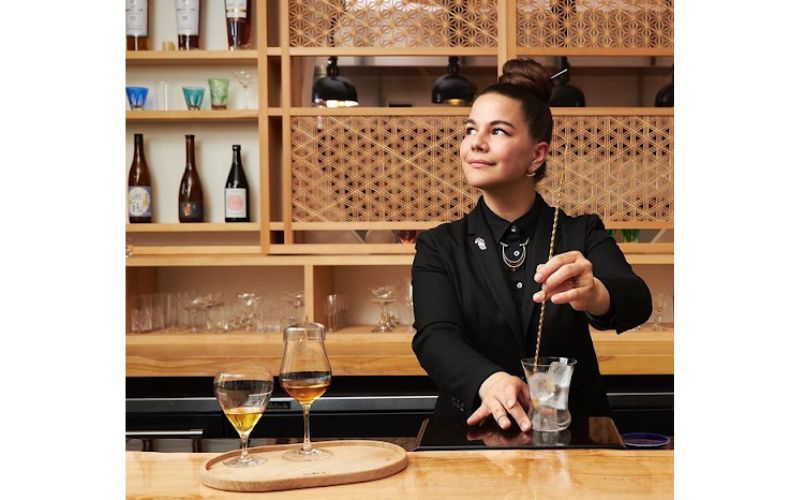 Julia Momose making a cocktail in a bar