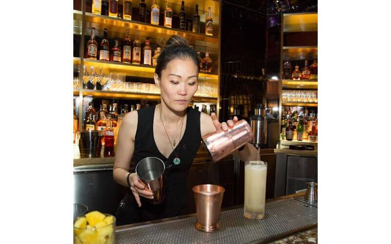 Juyoung Kang making a cocktail