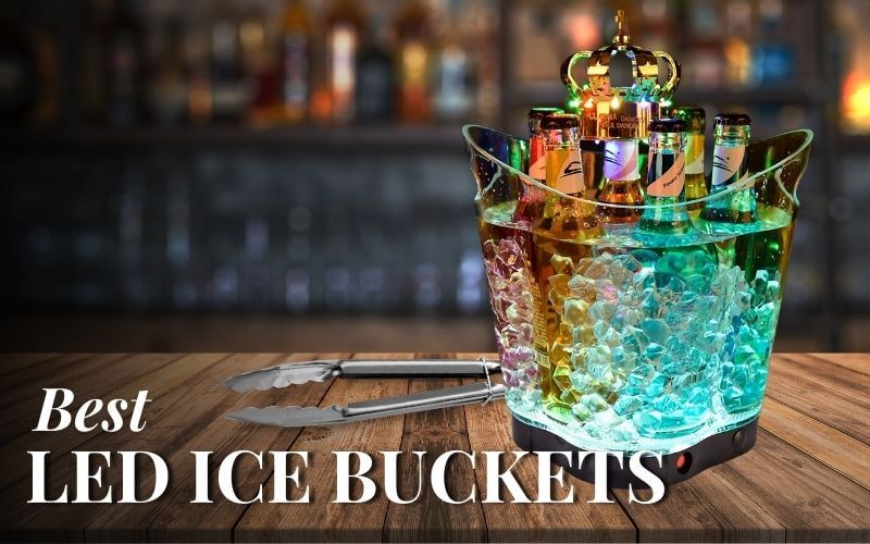 LED Ice bucket filled with bottles and a pair of ice tongs