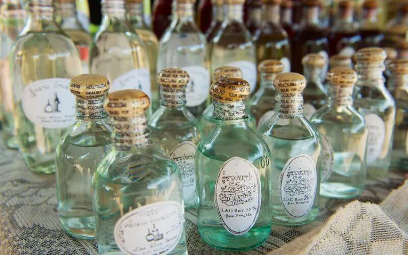Lao whiskey bottles - Image by Dmitry Chulov via Getty Images
