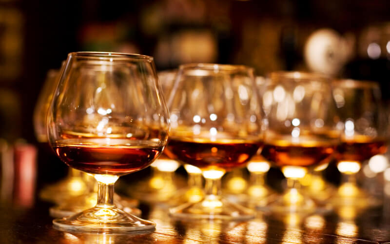 Lined up glasses of Cognac