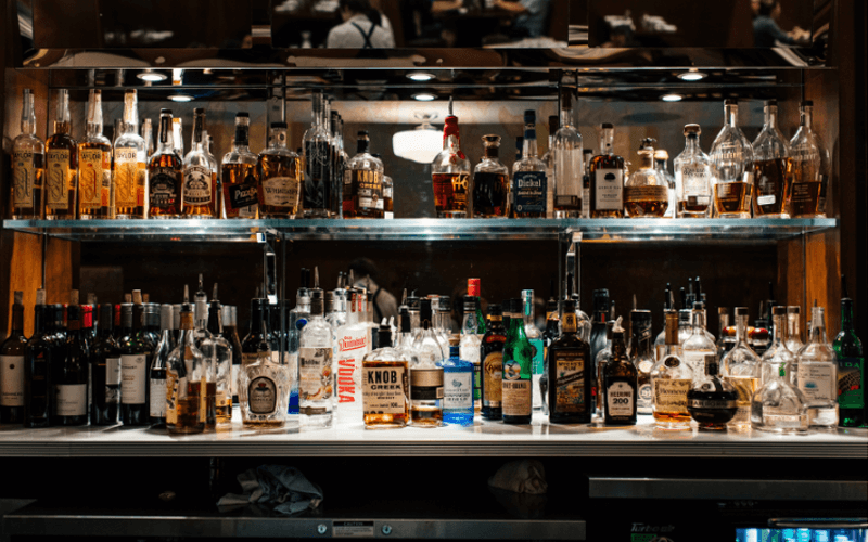 Liquor bottles on shelves in the bar