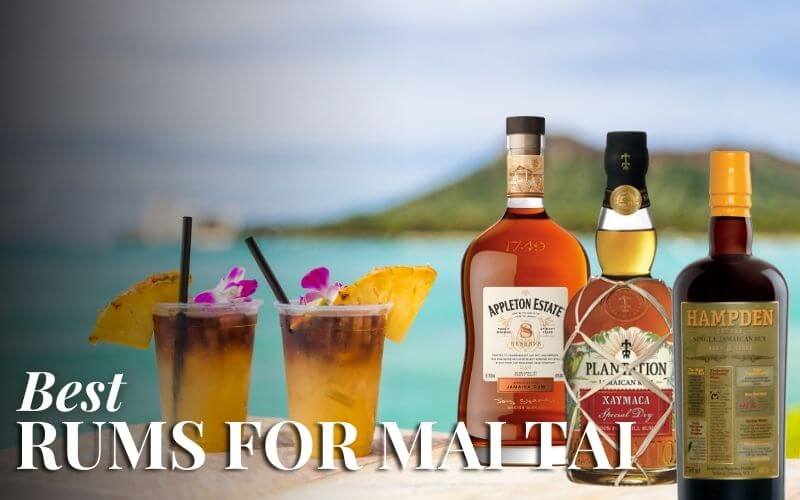 Mai Tais by the beach with three rum bottles