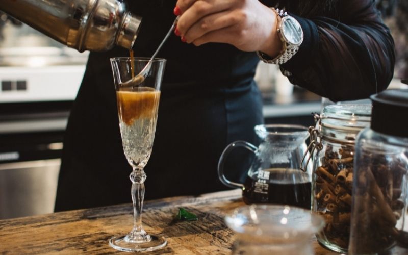 Man making cocktail mixed drinks