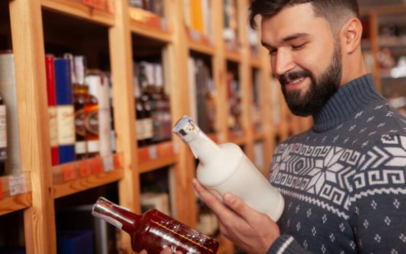 Man shopping for alcohol in a store