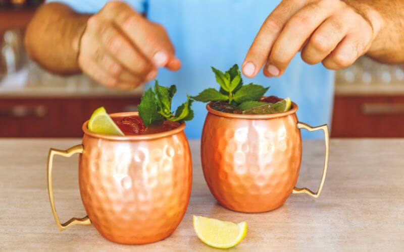 Moscow mule in copper mugs with mint garnishes