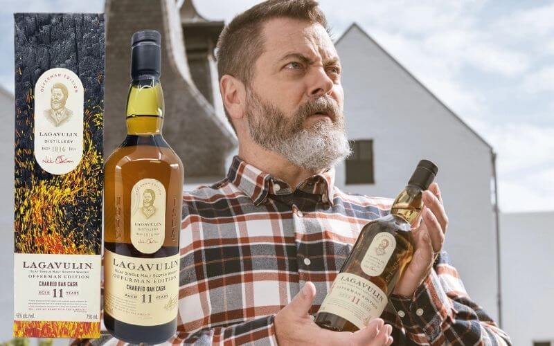 Nick Offerman holding a bottle of Lagavulin whiskey - Image by Fortune