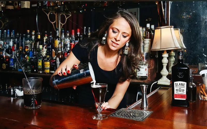 Pamela Wiznitzer holding a cocktail drink