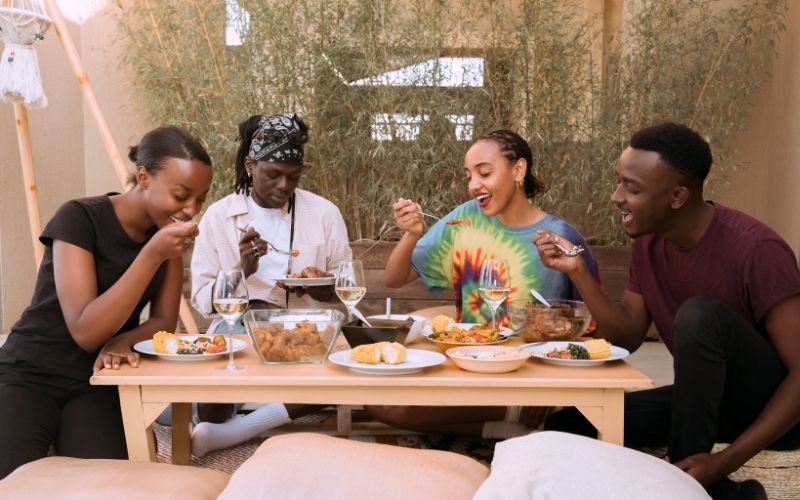 People eating on an outdoor snack bar