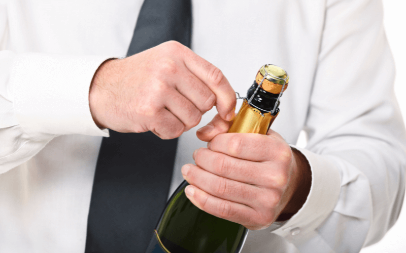 Champagne cork, wire cage, and mouth of a bottle