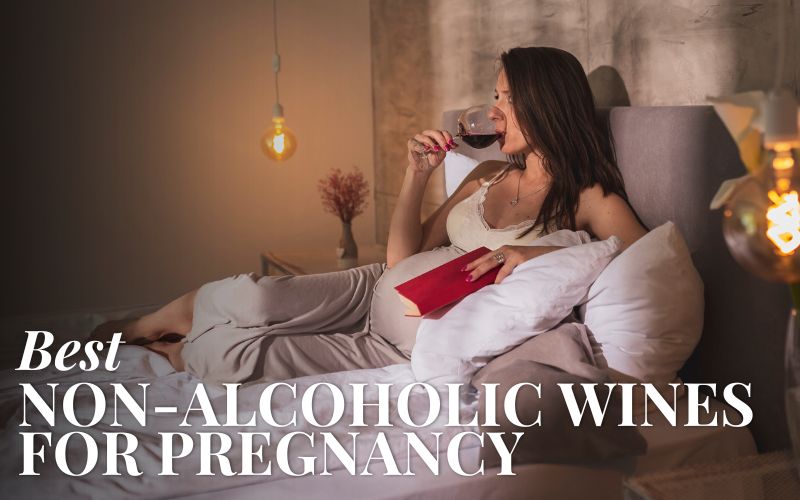Pregnant woman drinking wine on the bed
