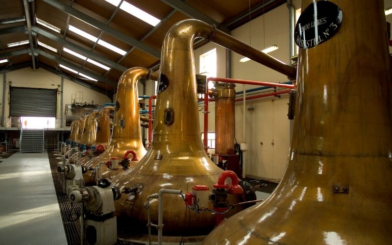 Stills Inside a Scottish whiskey distillery