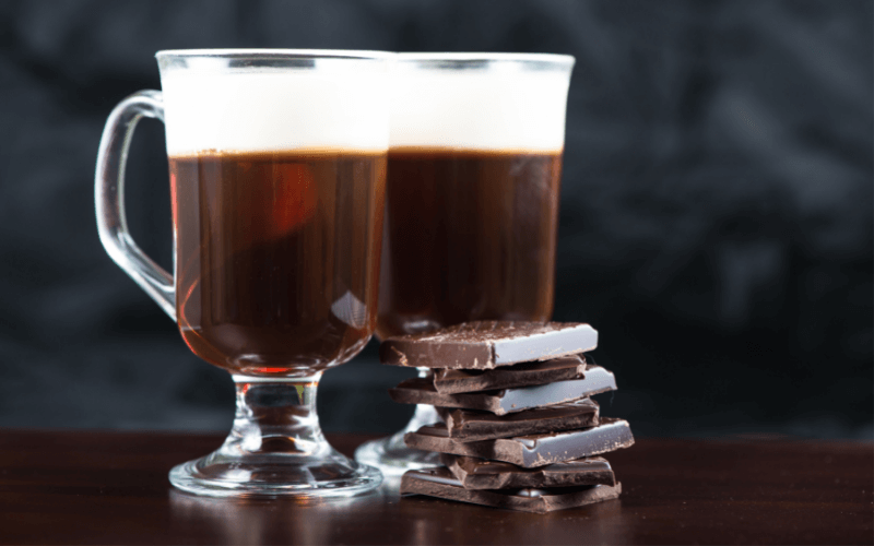 Traditional Strong Irish Coffee on Wooden Bar