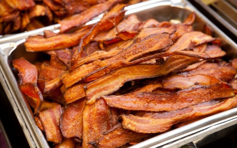 Tray of crispy bacon slices