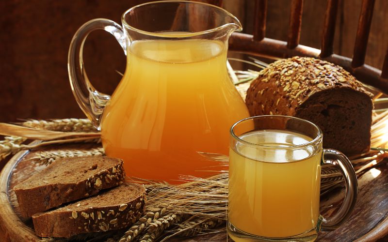 Kvass with rye bread on a wooden table