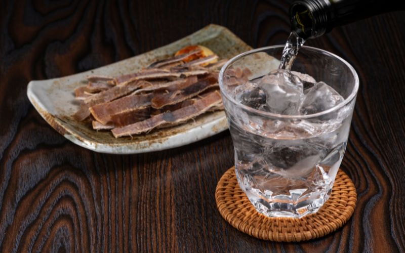 Shochu poured into a glass filled with ice