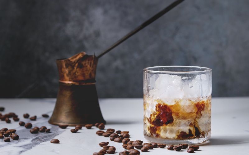 Cold brew coffee concentrate in a cocktail glass