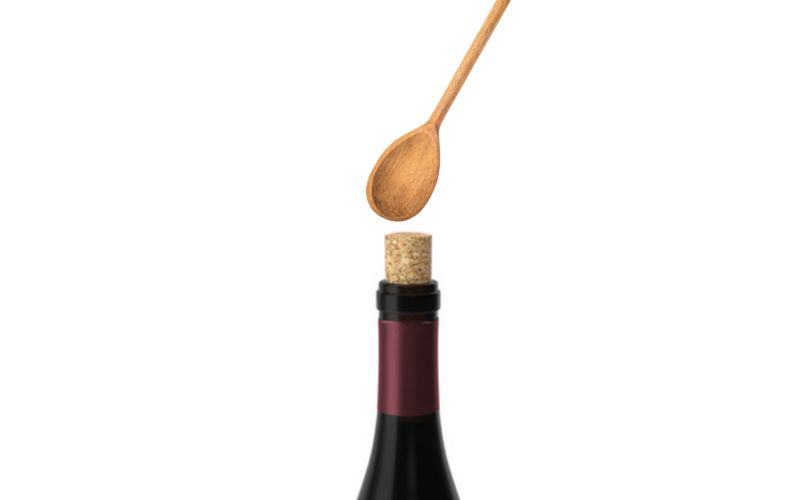 Use a Wooden Spoon - How to Open a Wine Bottle Without a Corkscrew