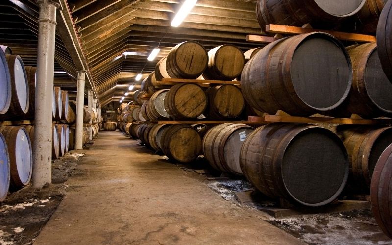 Whiskey in wooden barrels