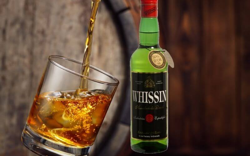 Whissin Whisky Alternative with glass and barrel 