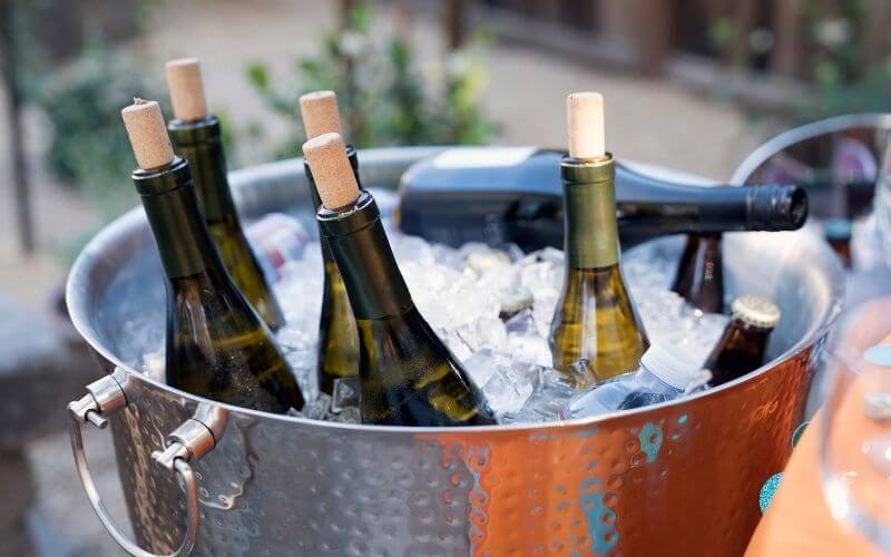 Wine bottles in an ice bucket