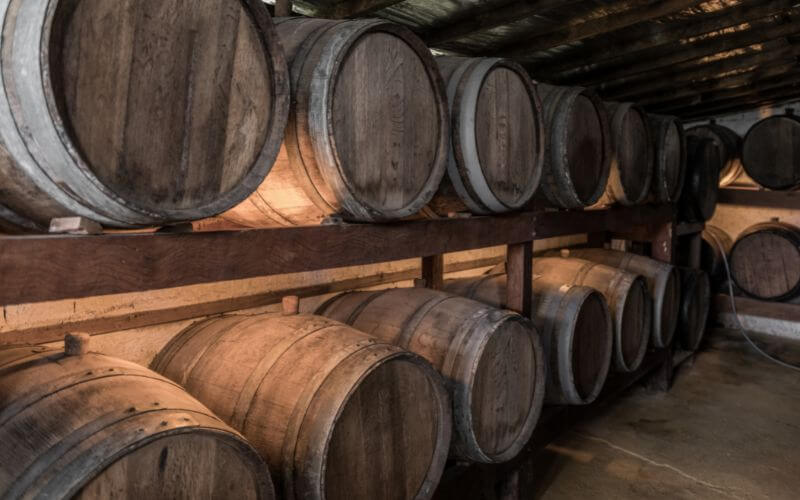 Wooden barrels with cachaca in a distillery