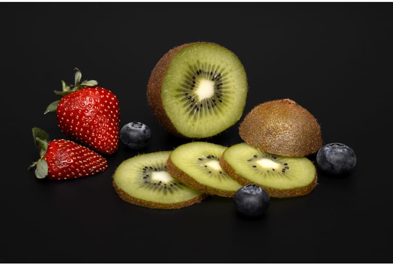 Assorted strawberries, kiwis, and blueberries
