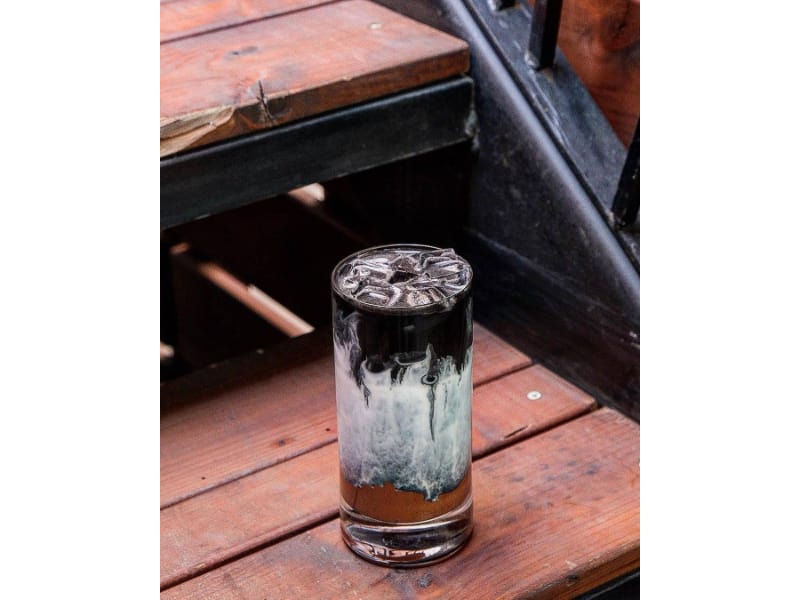 Black ice chocolate coffee cocktail in a highball glass
