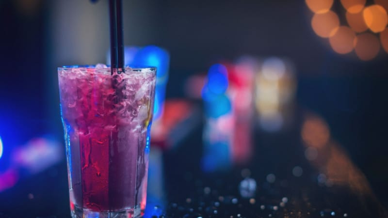 Blended Purple Rain Cocktail with straw