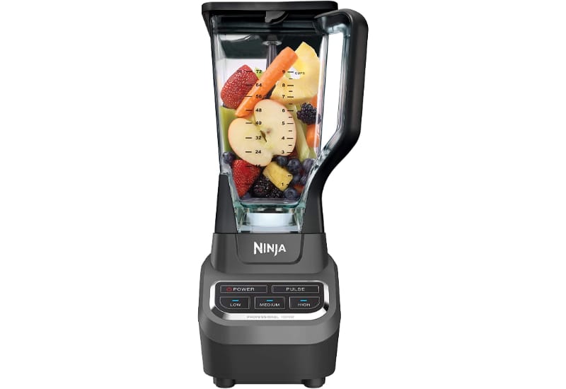 Blender with fruits and vegetables