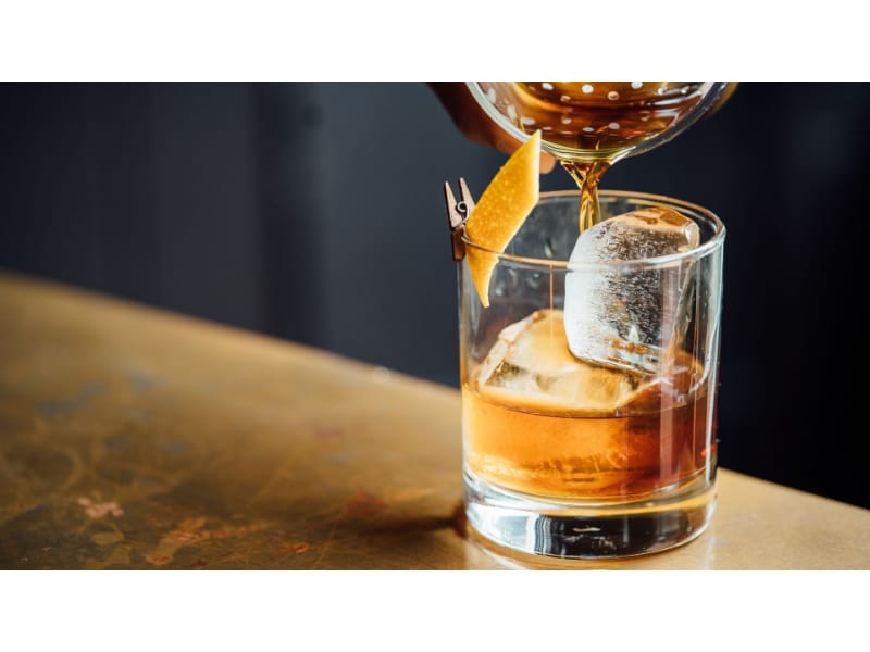 Brandy being poured into a glass