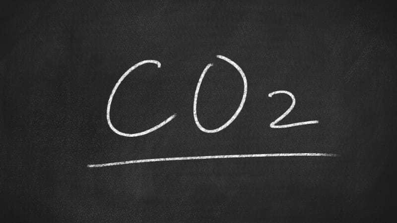 CO2 written on a chalkboard