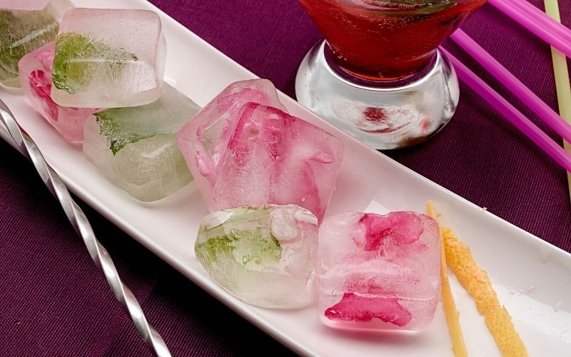 cocktail with Flower Ice Cubes composition