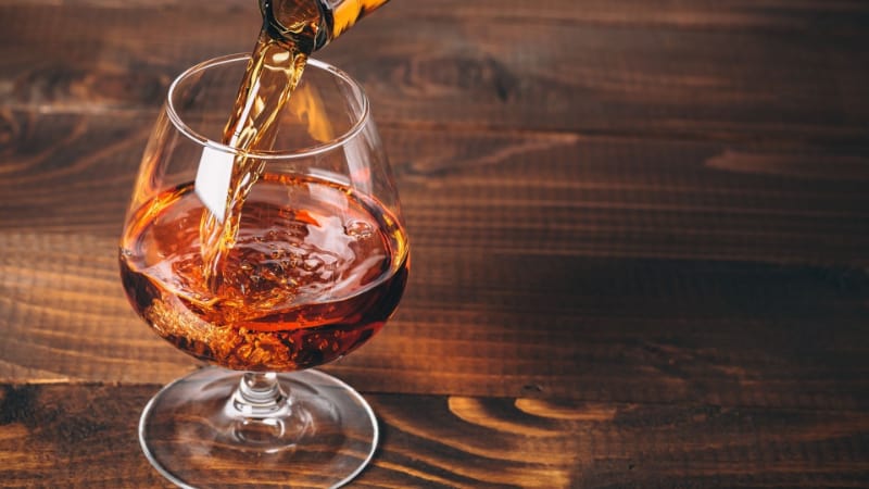 Cognac being poured into a glass