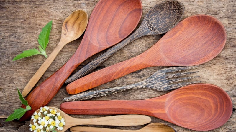 Different colors and sizes of a wooden spoon