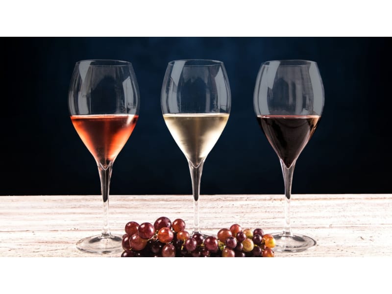 Different types of wines served in a wine glass