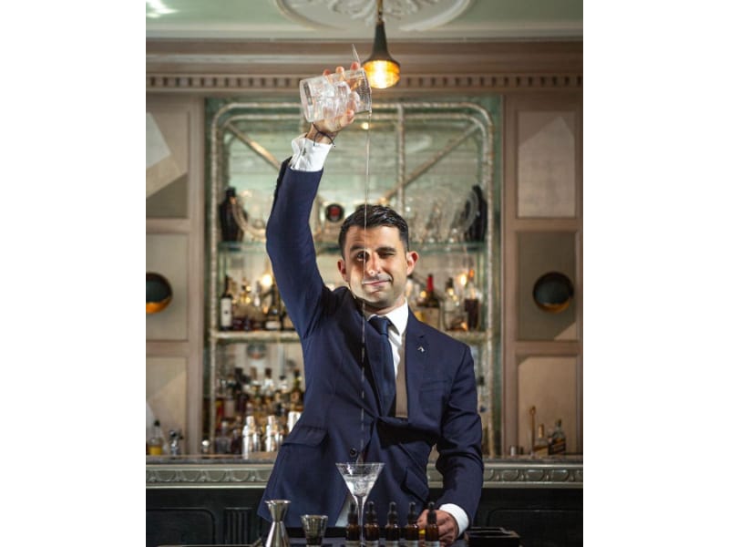 Giorgio Bargiani pouring liquor into a glass