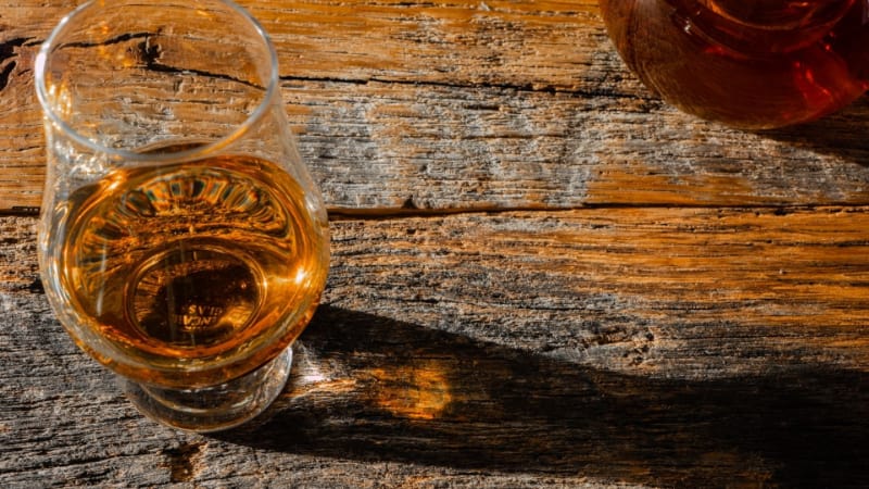 Glass of Irish whiskey on a wooden table