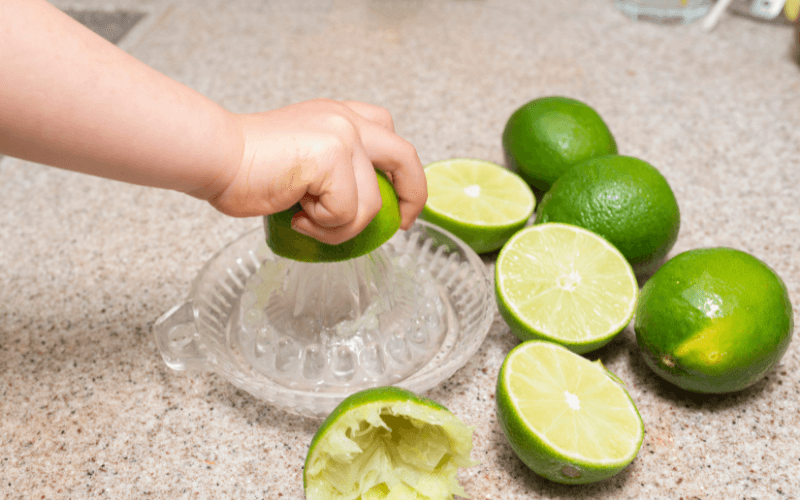 hand squeezing lime 