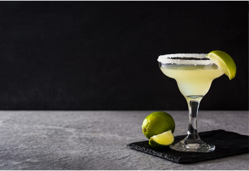 Margarita cocktail on dark background