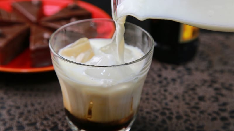 Milk being poured into Sombrero cocktail 