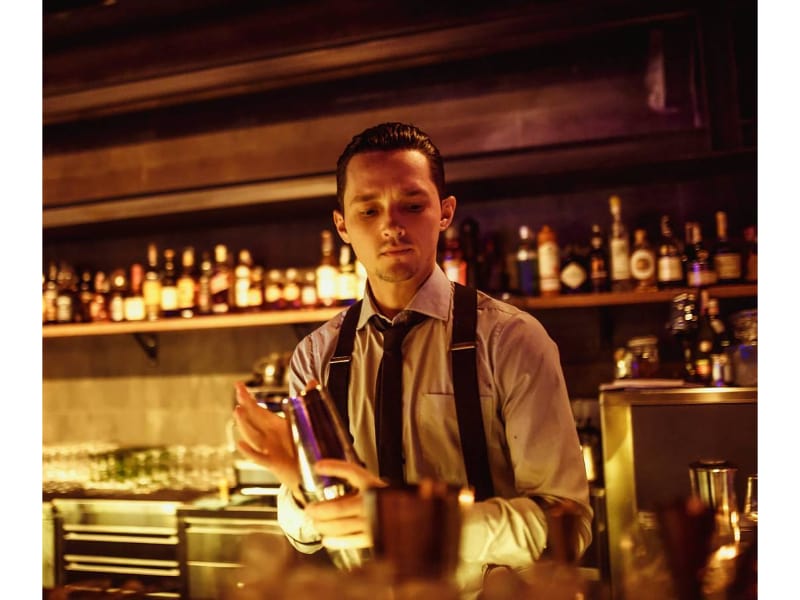 Mr.Tolmach holding a cocktail shaker