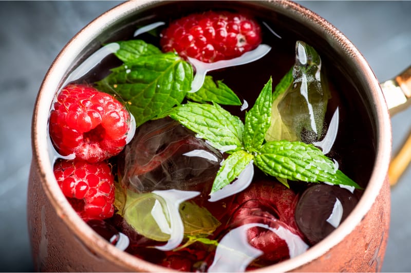 Raspberry Moscow Mule in a copper mug